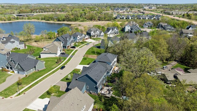 aerial view featuring a water view and a residential view