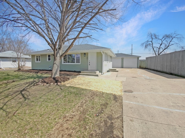 11601 Wren St NW, Coon Rapids, MN 55433 - ranch-style house with fence, an outdoor structure, and a garage