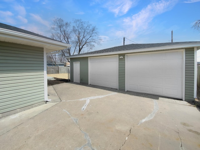 11601 Wren St NW, Coon Rapids, MN 55433 - detached garage featuring fence
