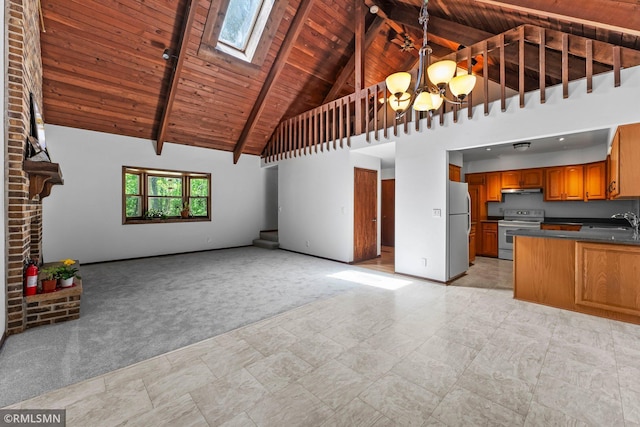 19405 Parkview Ave N, Scandia, MN 55073 - unfurnished living room with a chandelier, a skylight, a wood ceiling with exposed beams, high vaulted ceiling, and light carpet