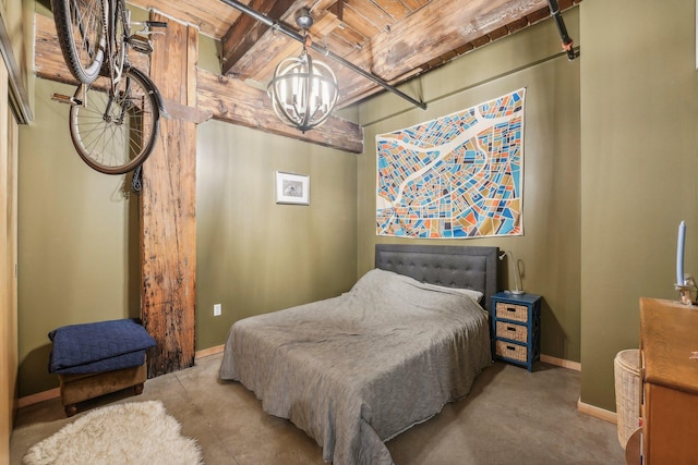 bedroom with a chandelier, baseboards, and wooden ceiling