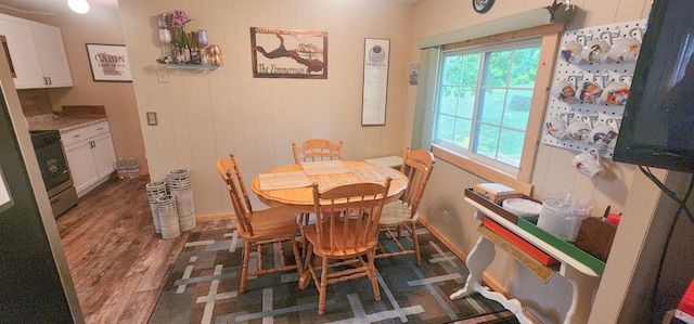 30280 County Highway 26, Holmesville Twp, MN 56501 - dining area featuring baseboards and wood finished floors