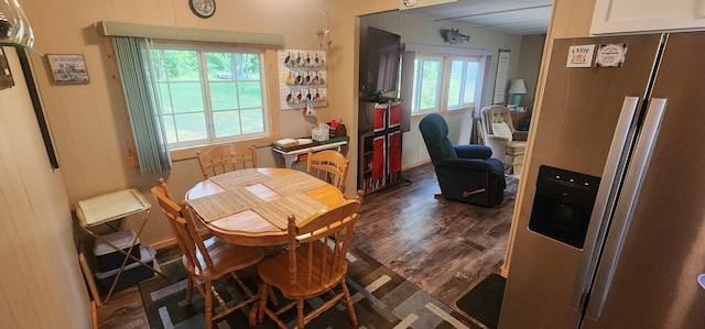 30280 County Highway 26, Holmesville Twp, MN 56501 - dining space featuring dark wood-type flooring and a healthy amount of sunlight