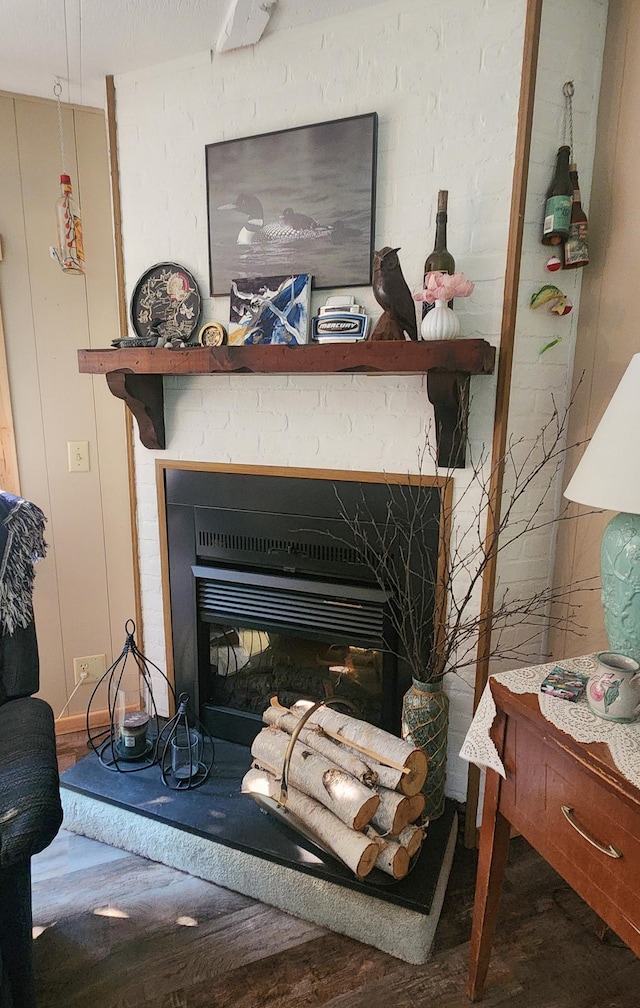 30280 County Highway 26, Holmesville Twp, MN 56501 - details with a fireplace and wood finished floors