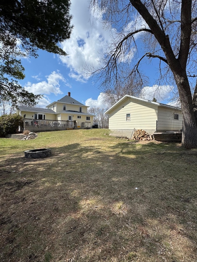601 Maplewood Dr SE, Pelican Rapids, MN 56572 - view of green lawn with a wooden deck