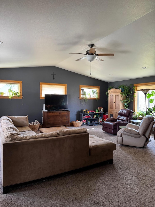 601 Maplewood Dr SE, Pelican Rapids, MN 56572 - carpeted living area with vaulted ceiling and ceiling fan