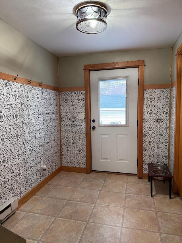 601 Maplewood Dr SE, Pelican Rapids, MN 56572 - entryway featuring baseboards and baseboard heating