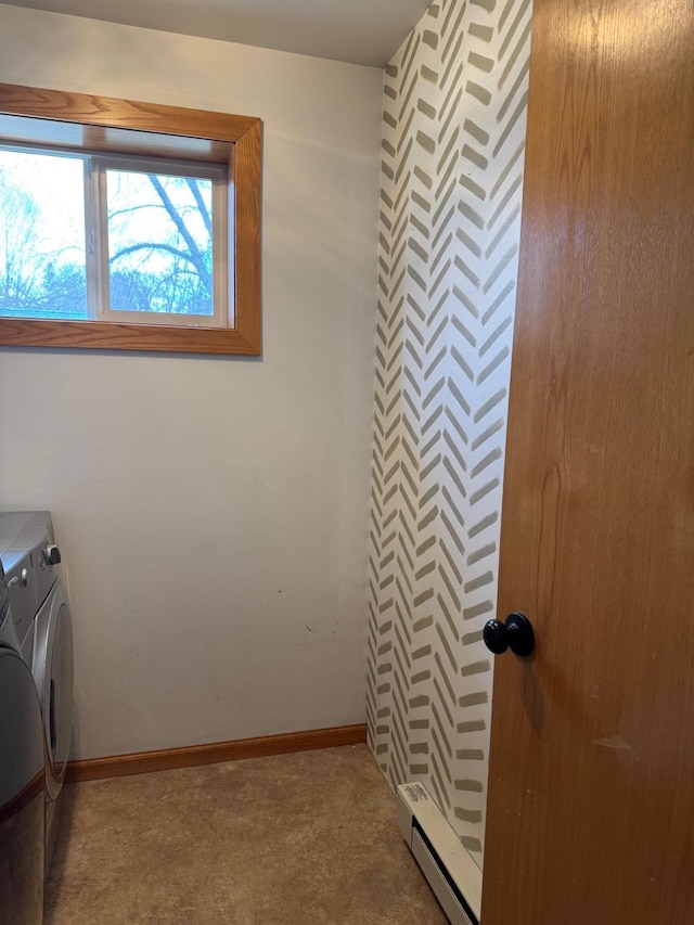 601 Maplewood Dr SE, Pelican Rapids, MN 56572 - laundry room featuring washer and dryer, baseboard heating, carpet, and baseboards
