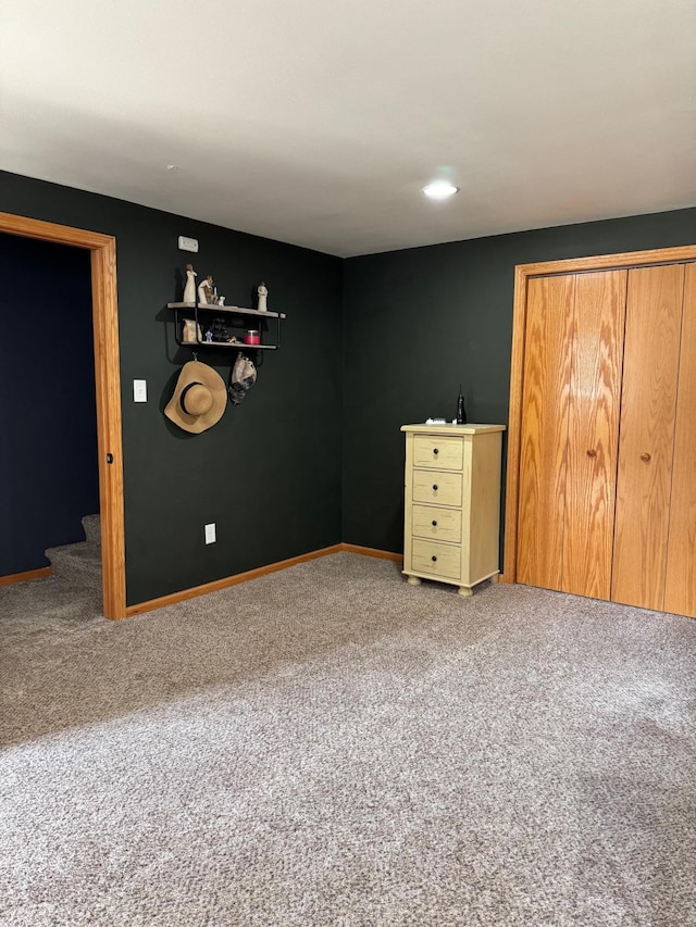 601 Maplewood Dr SE, Pelican Rapids, MN 56572 - unfurnished bedroom featuring carpet floors, baseboards, a closet, and recessed lighting