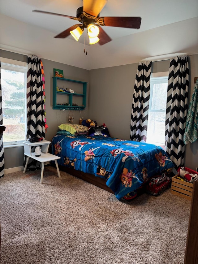 601 Maplewood Dr SE, Pelican Rapids, MN 56572 - carpeted bedroom featuring a ceiling fan