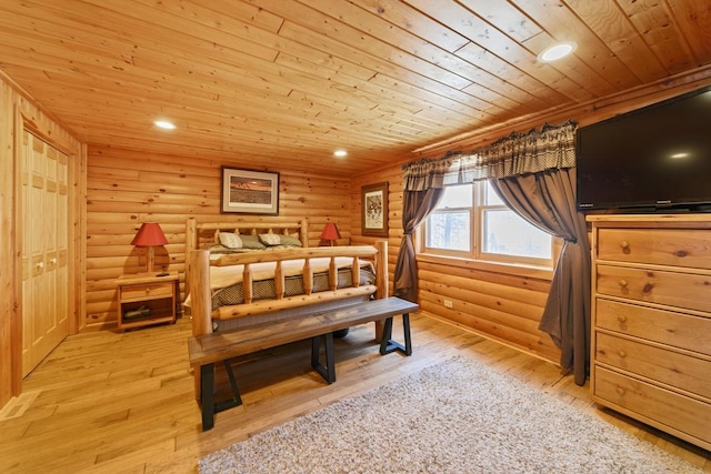 2746 Swift Ln NW, Hackensack, MN 56452 - bedroom with rustic walls, wooden ceiling, light wood-type flooring, and recessed lighting