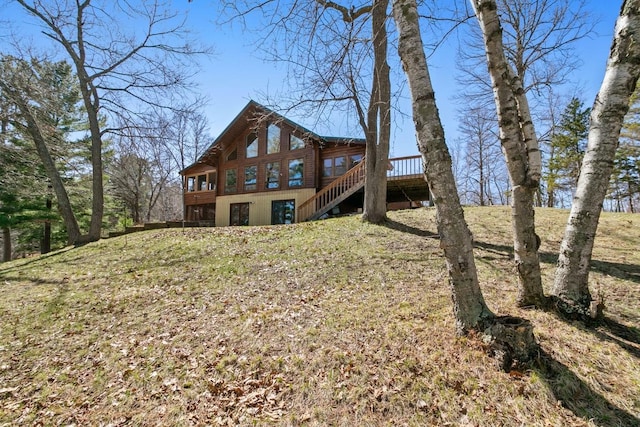 2746 Swift Ln NW, Hackensack, MN 56452 - rear view of house with stairway and a wooden deck