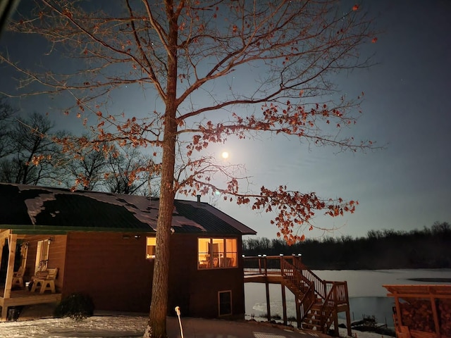back of house with a patio, stairway, and a deck