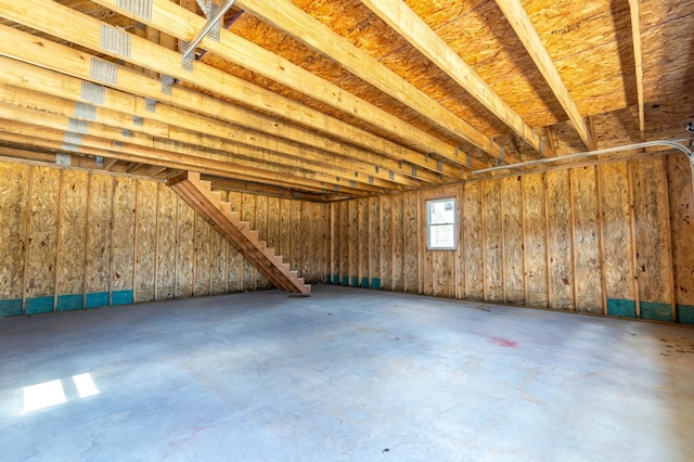 interior space with unfinished concrete floors