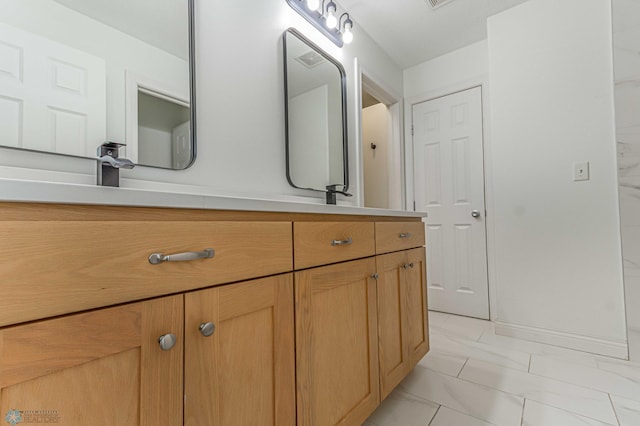 3463 Loberg Dr, West Fargo, ND 58078 - bathroom featuring marble finish flooring and vanity