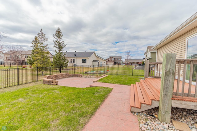 3463 Loberg Dr, West Fargo, ND 58078 - view of yard featuring a residential view, a wooden deck, and a patio area
