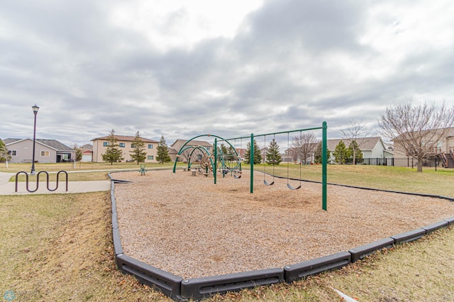 3463 Loberg Dr, West Fargo, ND 58078 - community playground featuring a lawn and a residential view