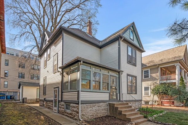 3144 Girard Ave S, Minneapolis, MN 55408 - view of front of home with a chimney
