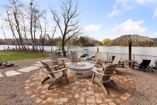 5320 132nd St W, Apple Valley, MN 55124 - view of patio / terrace featuring an outdoor fire pit, fence, and a water view