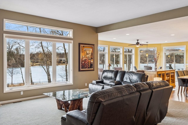 5320 132nd St W, Apple Valley, MN 55124 - carpeted living room with a healthy amount of sunlight, a ceiling fan, visible vents, and recessed lighting