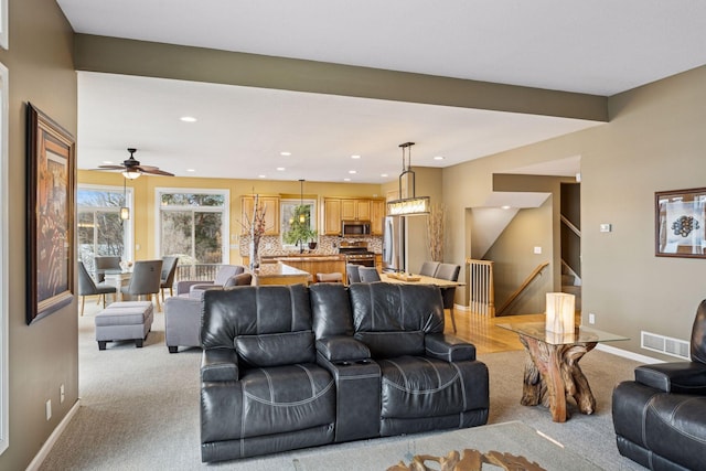 5320 132nd St W, Apple Valley, MN 55124 - living area featuring baseboards, visible vents, light carpet, and recessed lighting