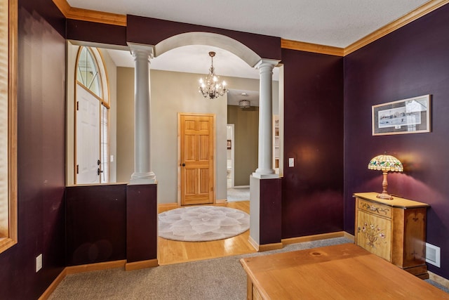 5320 132nd St W, Apple Valley, MN 55124 - foyer entrance with decorative columns, a chandelier, and baseboards