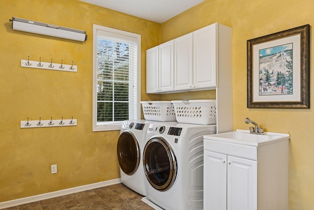 5320 132nd St W, Apple Valley, MN 55124 - washroom with a sink, washer and dryer, cabinet space, and baseboards