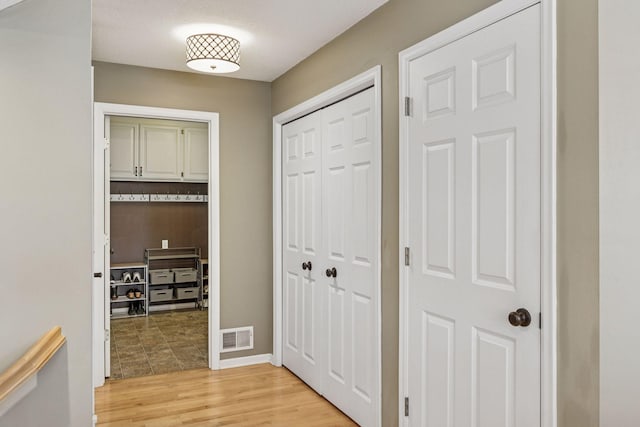 5320 132nd St W, Apple Valley, MN 55124 - corridor featuring visible vents and light wood-style floors