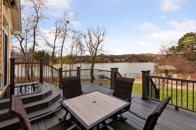 5320 132nd St W, Apple Valley, MN 55124 - wooden deck featuring outdoor dining area and a water view