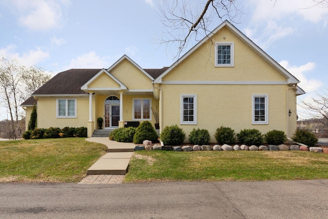 5320 132nd St W, Apple Valley, MN 55124 - view of front facade featuring stucco siding and a front yard