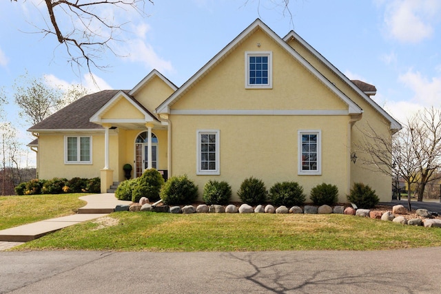 5320 132nd St W, Apple Valley, MN 55124 - view of front of house featuring stucco siding and a front lawn