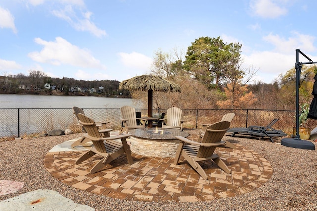 5320 132nd St W, Apple Valley, MN 55124 - view of patio with a fire pit, fence, and a water view