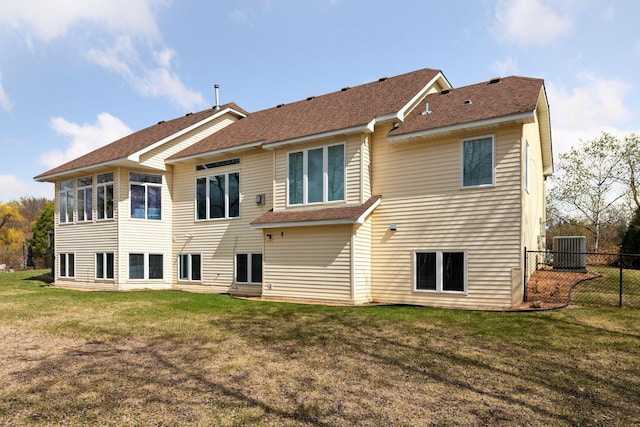 5320 132nd St W, Apple Valley, MN 55124 - rear view of house with a yard, central AC, a shingled roof, and fence