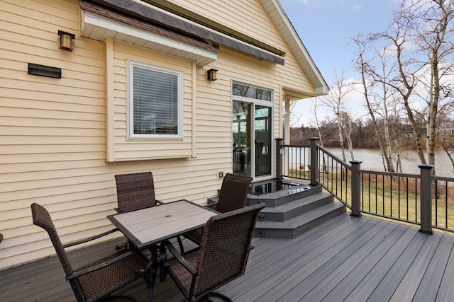 5320 132nd St W, Apple Valley, MN 55124 - wooden deck with outdoor dining space and a water view