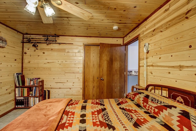 6775 State 87 SW, Backus, MN 56435 - bedroom with wooden walls, wooden ceiling, and tile patterned flooring