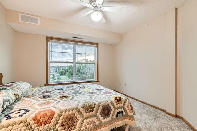 5650 Boone Ave N Unit 315, New Hope, MN 55428 - bedroom with carpet, ceiling fan, and a textured ceiling