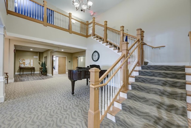 5650 Boone Ave N Unit 315, New Hope, MN 55428 - stairs with a high ceiling, carpet, and a chandelier