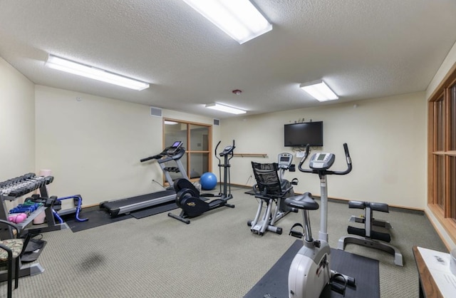 5650 Boone Ave N Unit 315, New Hope, MN 55428 - workout area with a textured ceiling