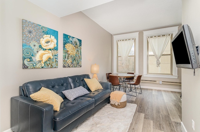 living room featuring wood finished floors and baseboards