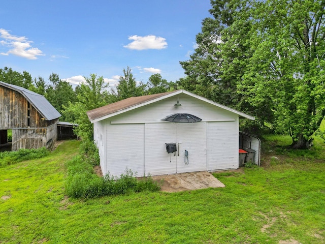 4235 277th Ave NW, Isanti, MN 55040 - view of barn featuring a lawn