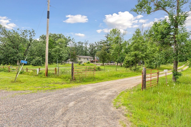 4235 277th Ave NW, Isanti, MN 55040 - view of dirt / gravel road with a rural view