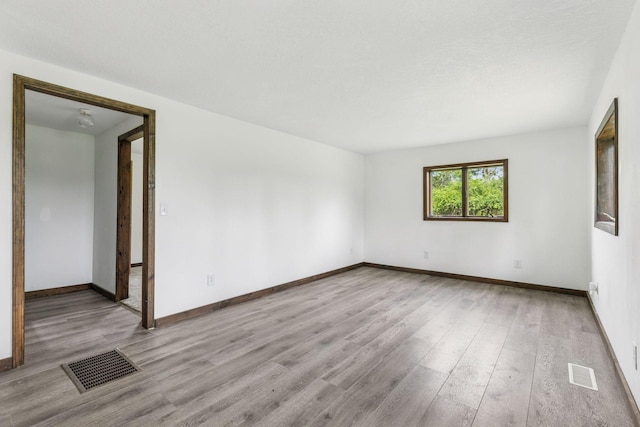 4235 277th Ave NW, Isanti, MN 55040 - spare room with wood finished floors