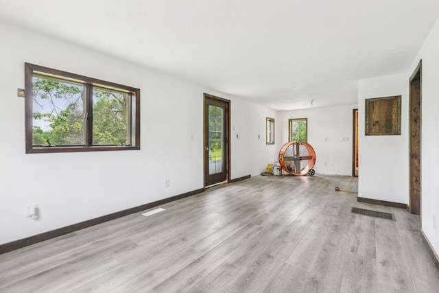 4235 277th Ave NW, Isanti, MN 55040 - empty room featuring light wood-style flooring and baseboards