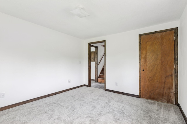 4235 277th Ave NW, Isanti, MN 55040 - unfurnished bedroom with carpet and baseboards
