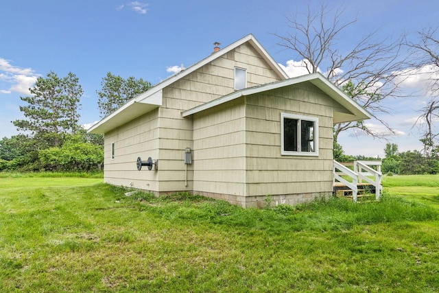 4235 277th Ave NW, Isanti, MN 55040 - view of home's exterior featuring a yard