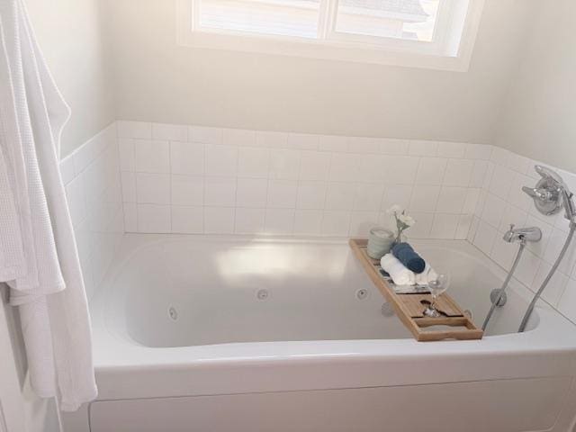 bathroom featuring a whirlpool tub