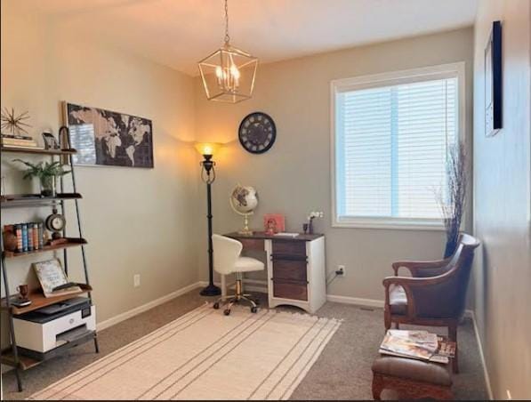 office featuring a chandelier, carpet floors, and baseboards