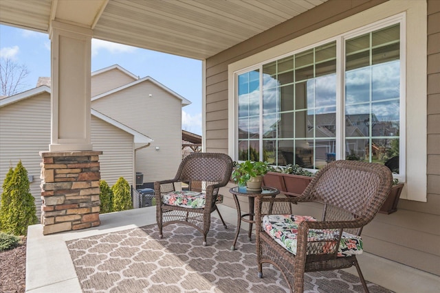 view of patio featuring a porch