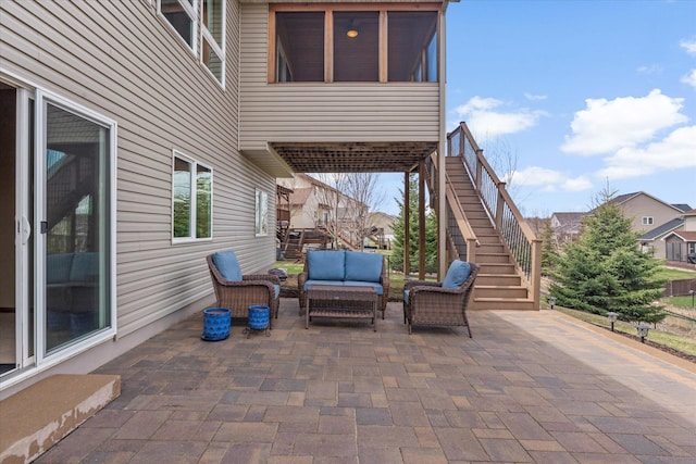 view of patio / terrace featuring stairs and an outdoor hangout area