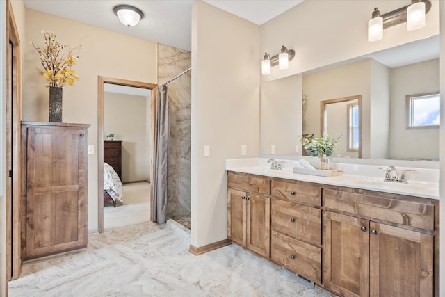 bathroom featuring a sink, double vanity, ensuite bathroom, marble finish floor, and curtained shower